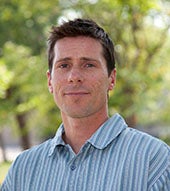 headshot of Dr. Sean Swenson (source: https://news.ucar.edu/7647/reservoirs-beneath-our-feet)